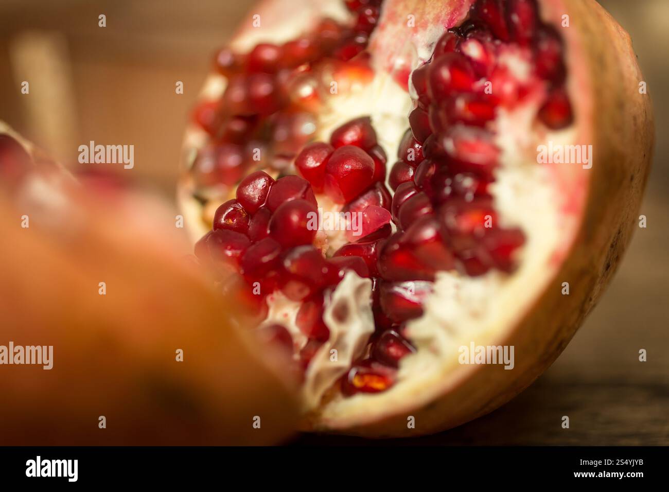 Macro shot of pomegranate halves Stock Photo