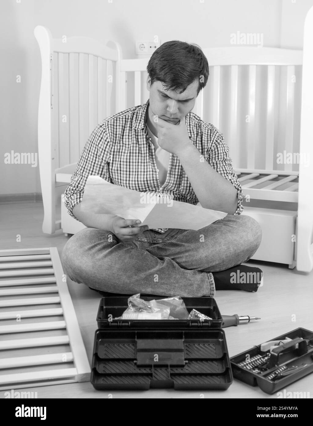 Confused young caucasian man Black and White Stock Photos & Images - Alamy