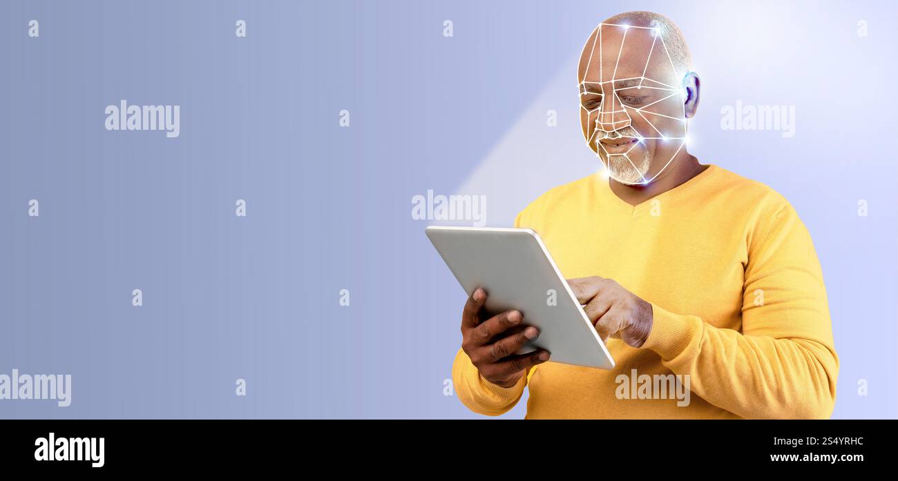 Man using modern technology for facial recognition on tablet device Stock Photo
