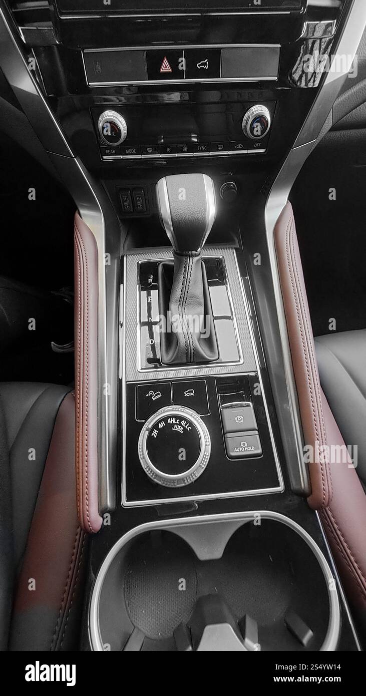 Automatic gearbox handle in a car as background Stock Photo