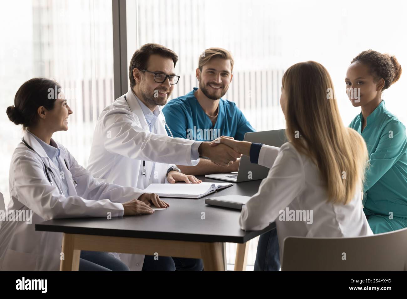Group of healthcare professionals accomplish team meeting with ...