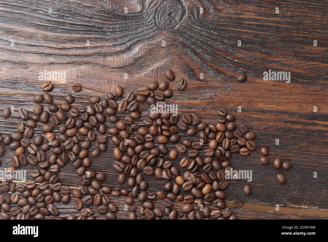 Coffee beans on the dark wooden background Stock Photo