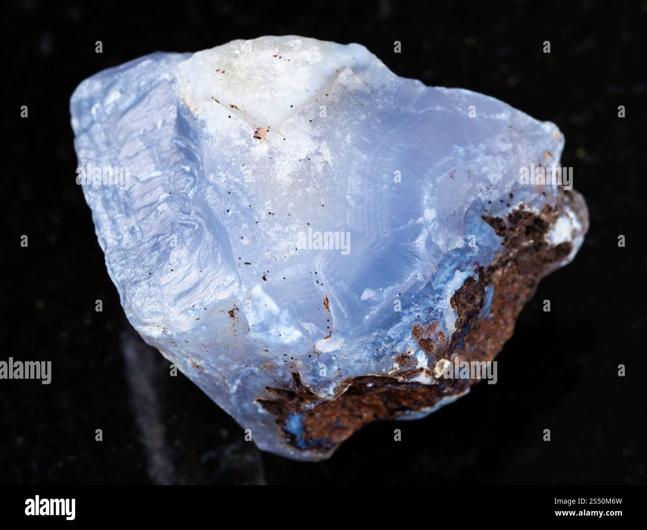 macro shooting of natural mineral rock specimen - rough crystal of blue ...