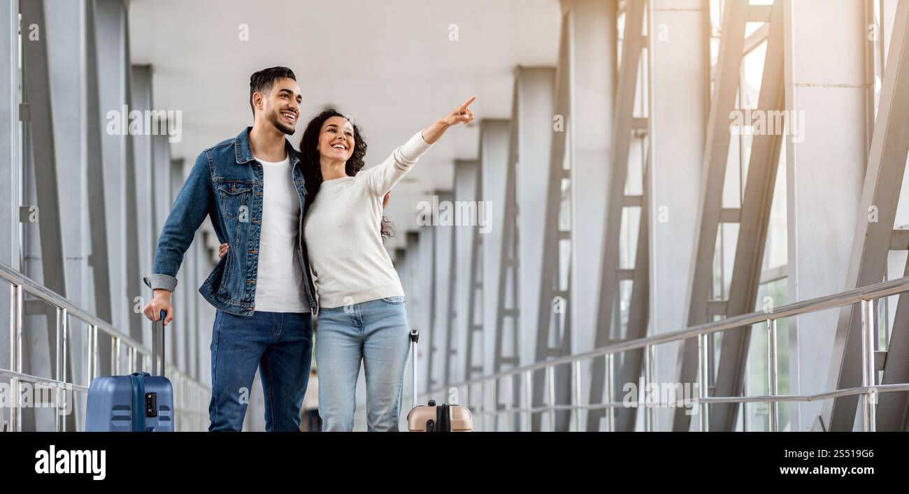 Travel Advertisement. Happy Middle Eastern Couple Standing In Airport ...