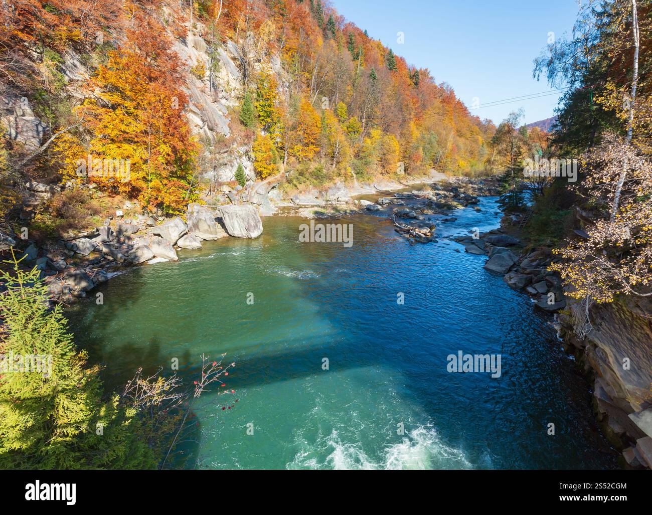 Prut River autumn landscape (Yaremche, Ivano-Frankivsk Oblast, Ukraine). View from bridge. Stock Photo
