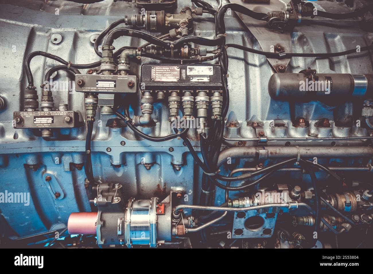 Old vintage airplane engine closeup view. Industrial background. Old vintage airplane engine Stock Photo