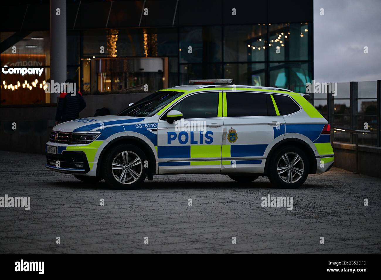 Stockholm, Uppland, Sweden. December 29 2024. Police car parked outside the Mall of Scandinavia. Stock Photo