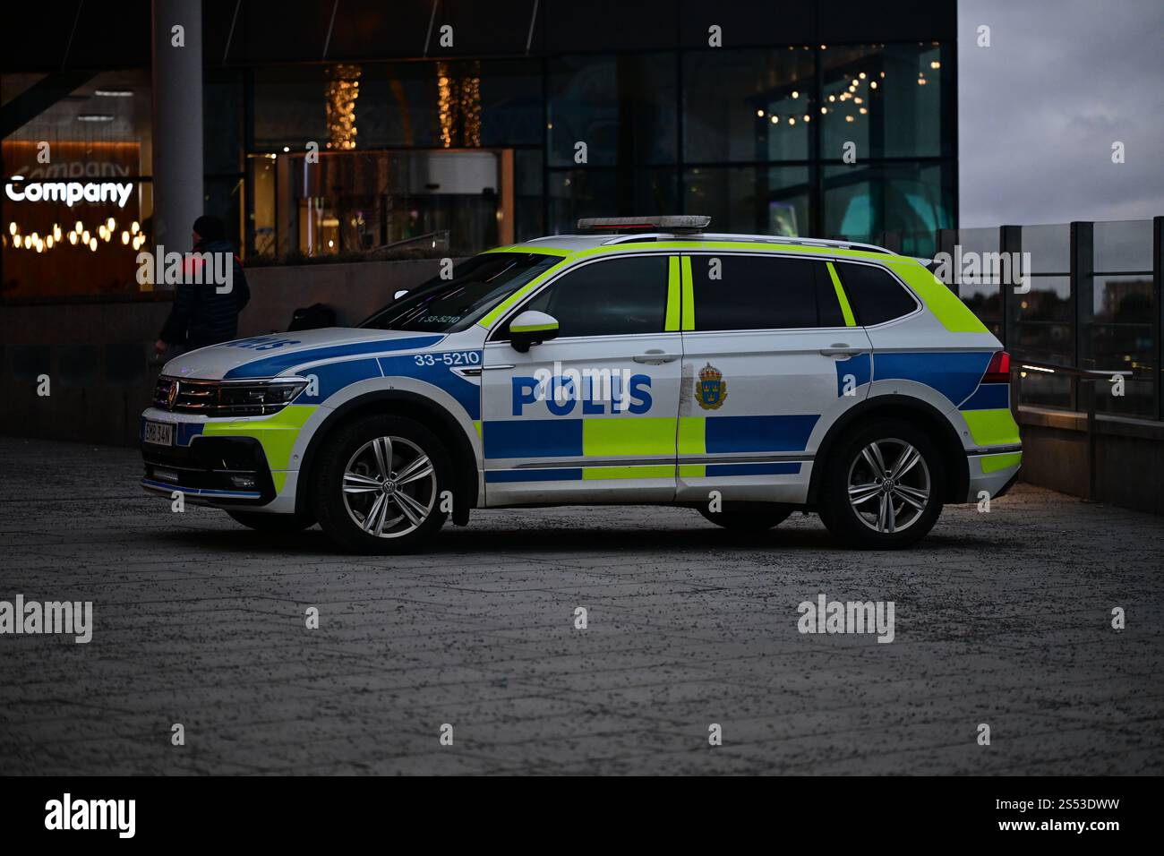 Stockholm, Uppland, Sweden. December 29 2024. Police car parked outside the Mall of Scandinavia. Stock Photo
