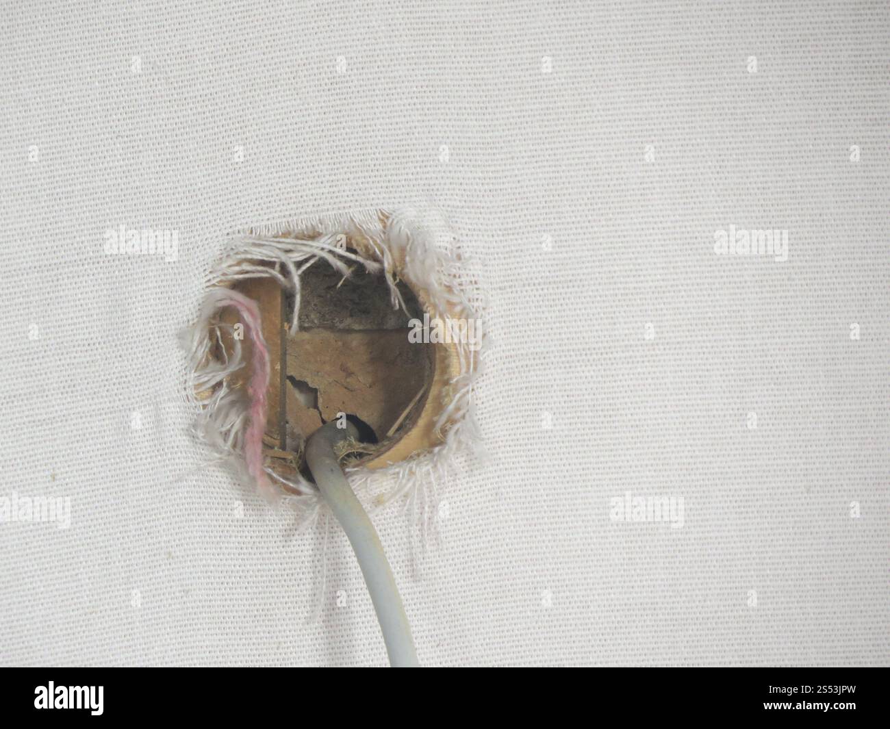Socket Opening Wall Opening For A Socket Outlet, Two Cables Are Visible Stock Photo ...