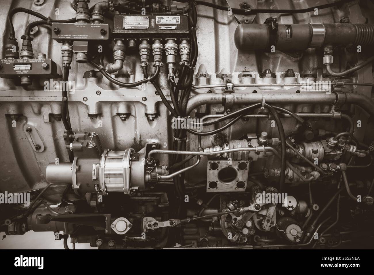 Old vintage airplane engine closeup view. Industrial black and white background. Old vintage airplane engine. Black and white photo Stock Photo