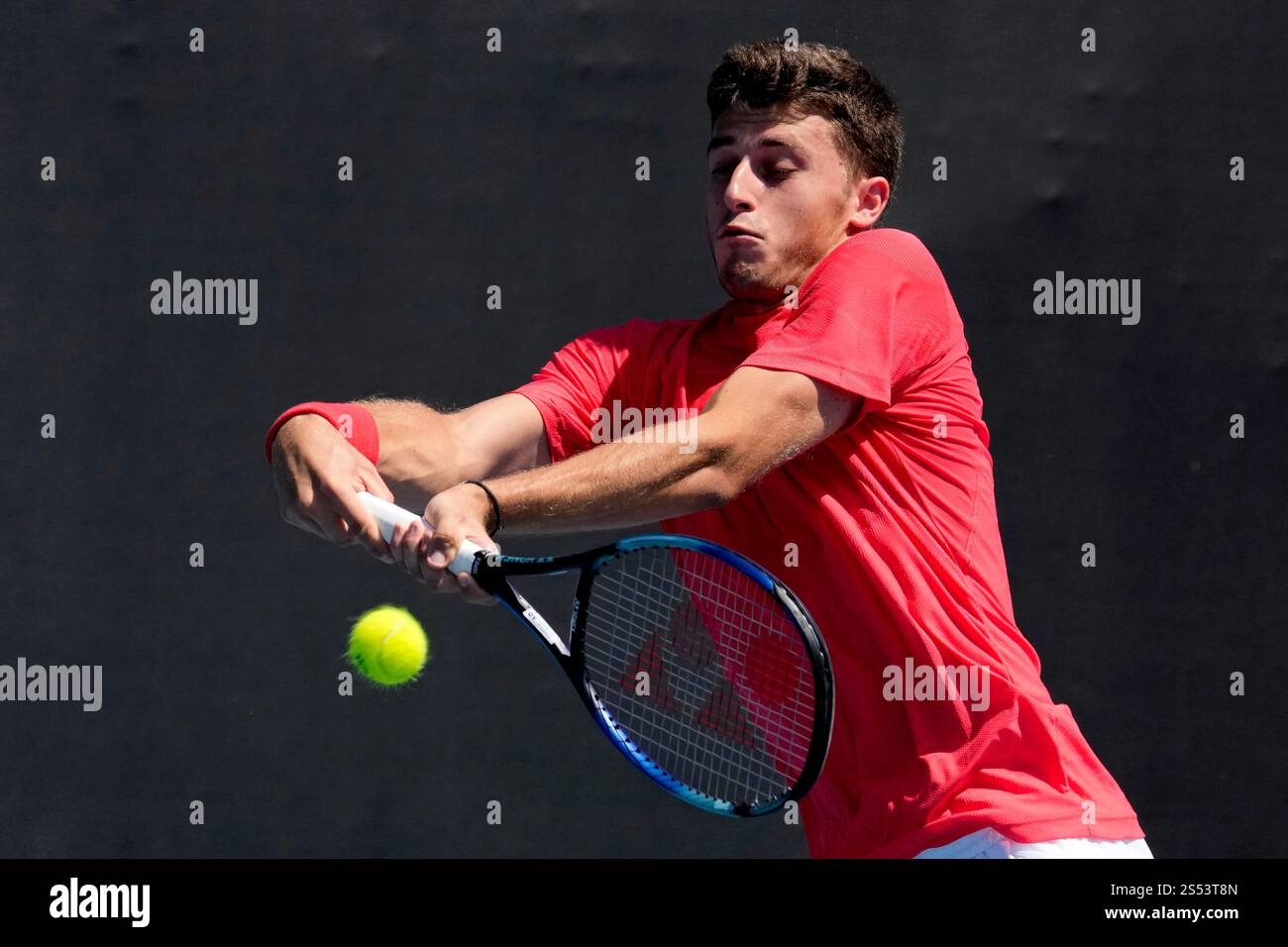 Luca Nardi of Italy plays a backhand return to Gabriel Diallo of Canada