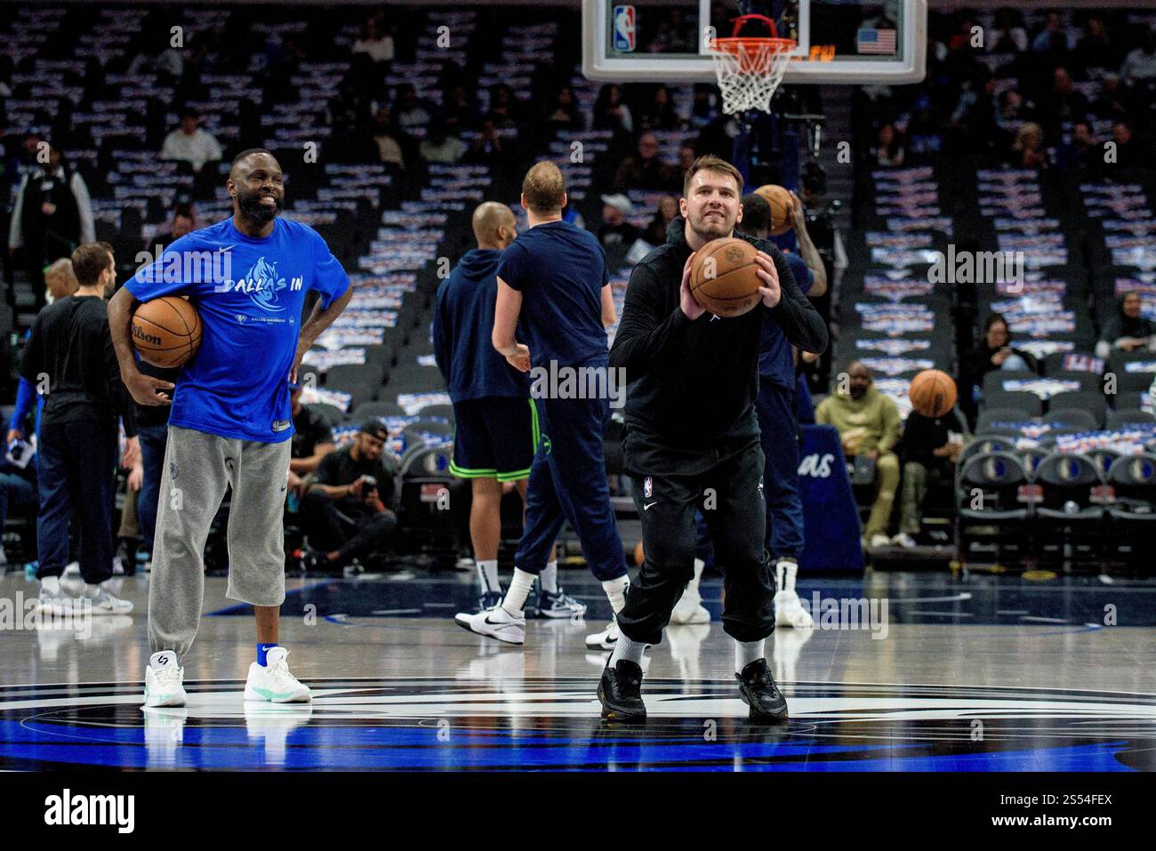 Dallas Mavericks guard Luka Doncic practices a half-court shot prior to ...