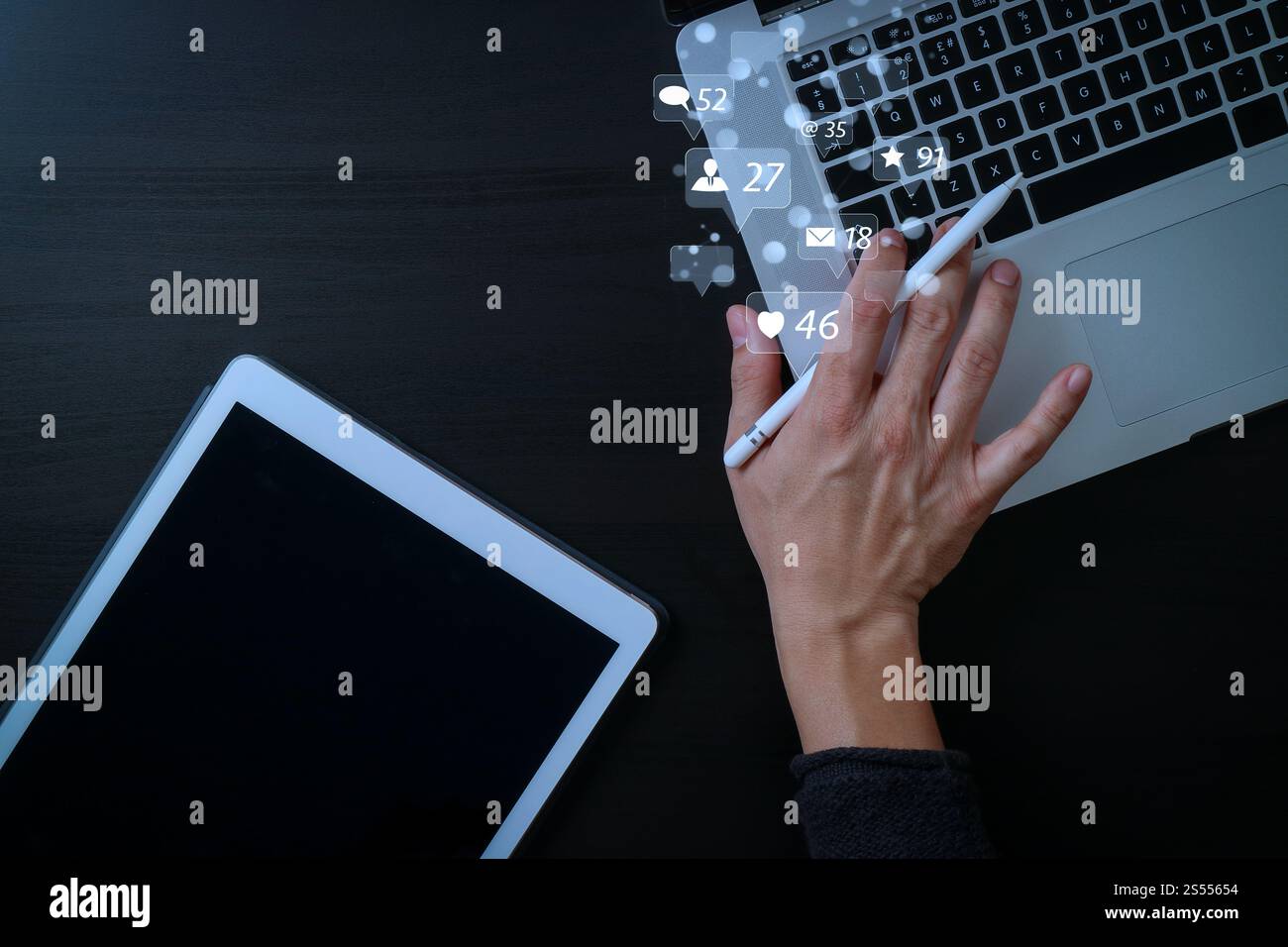 Social media and Marketing virtual icons screen concept.cyber security internet and networking concept.Businessman hand working with laptop computer Stock Photo