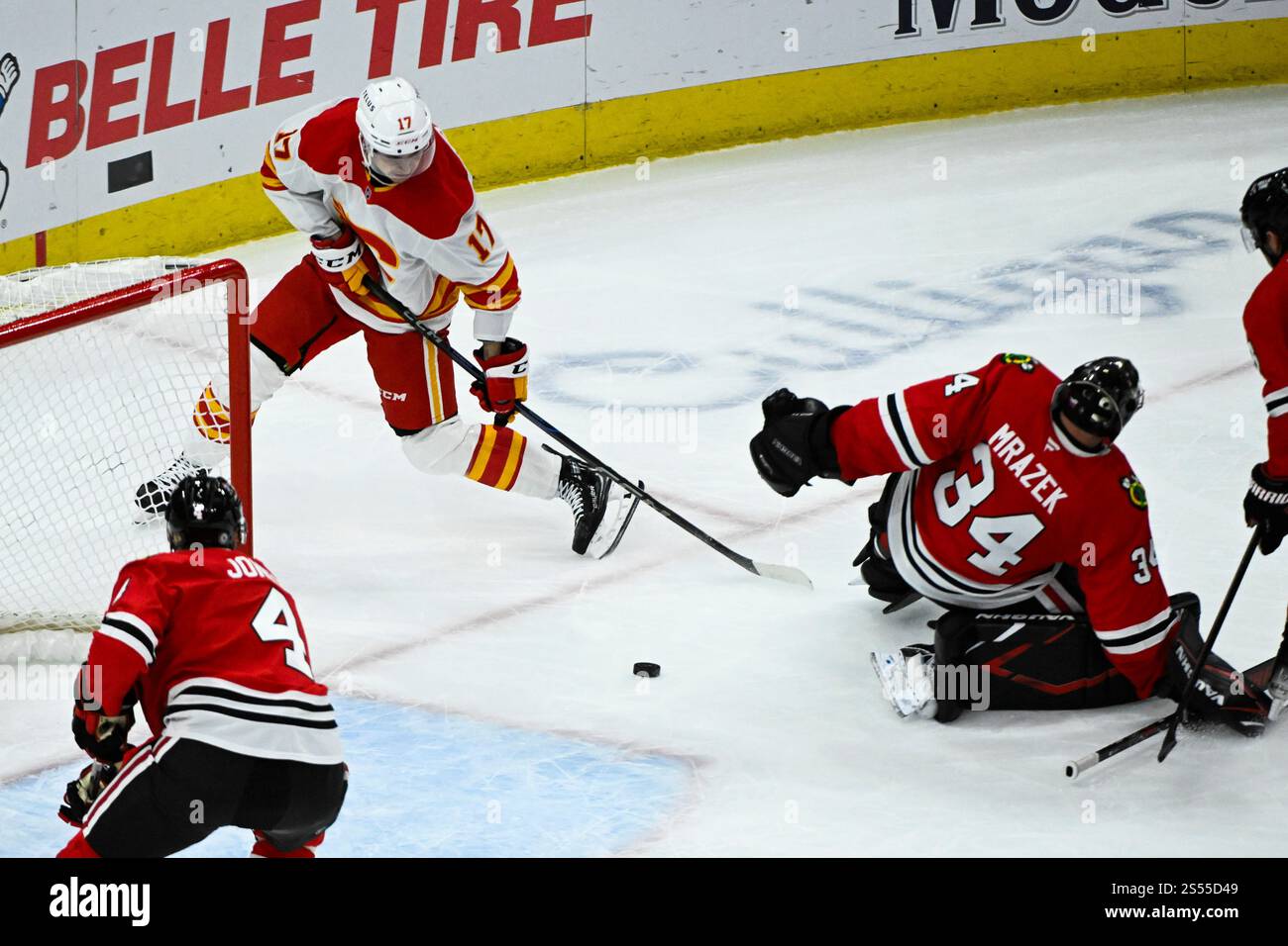 Calgary Flames center Yegor Sharangovich (17) scores a goal past ...
