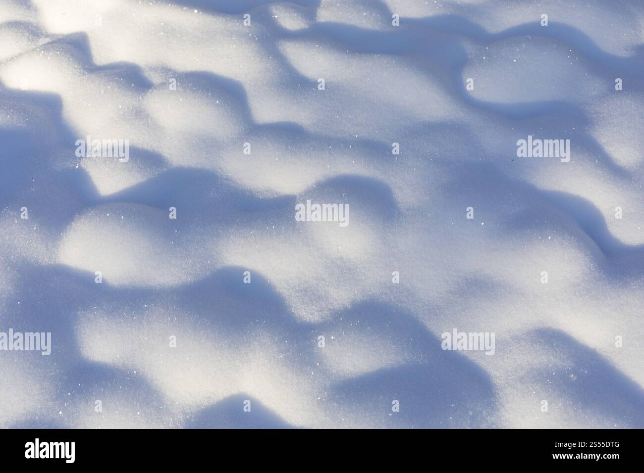 Hilly surface due to snow on uneven ground Stock Photo