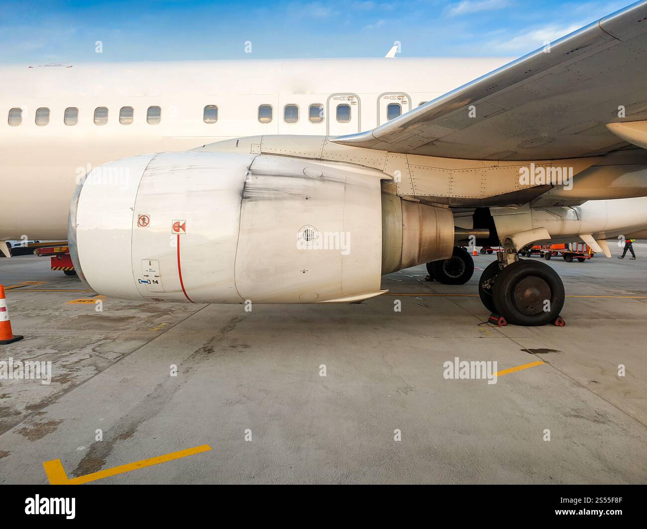 Image of big airplane jet engine parked in airport. Photo of big airplane jet engine parked in airport Stock Photo