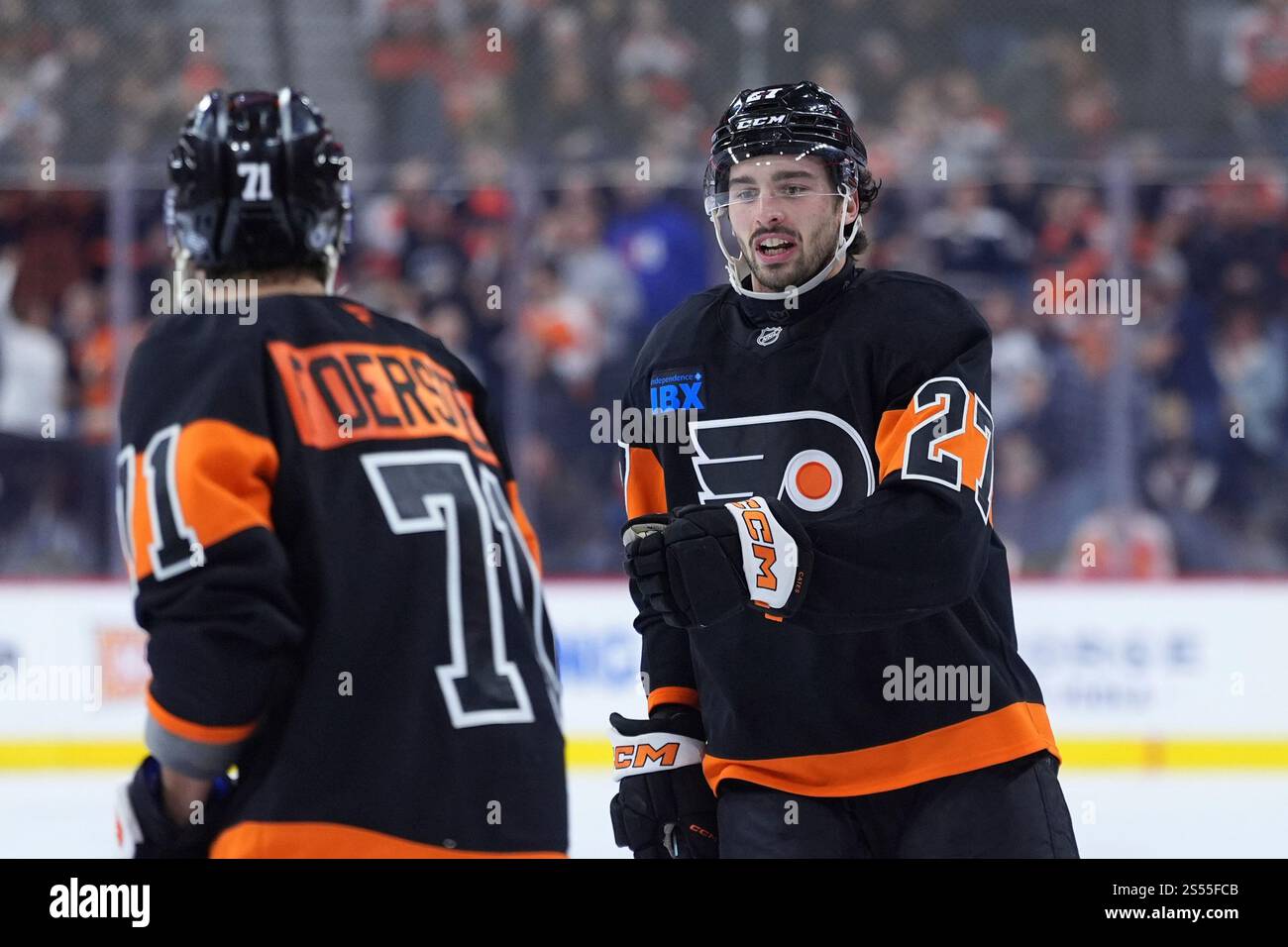 Philadelphia Flyers' Noah Cates, right, and Tyson Foerster celebrate