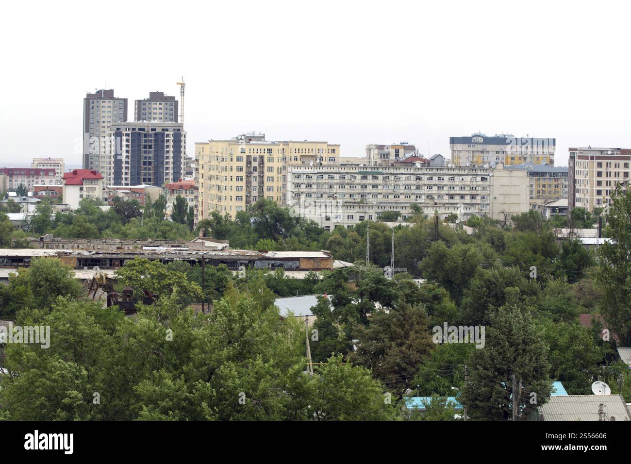 View of Kyrgyzstan, high-rise buildings and old factories in Bishkek, Asia ...