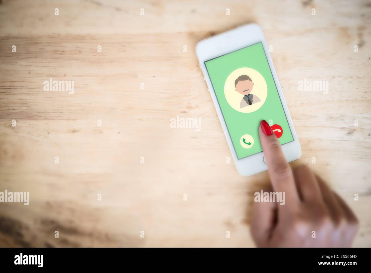 Incoming call from dad in a mobile phone. Woman touching on mobile screen. Stock Photo