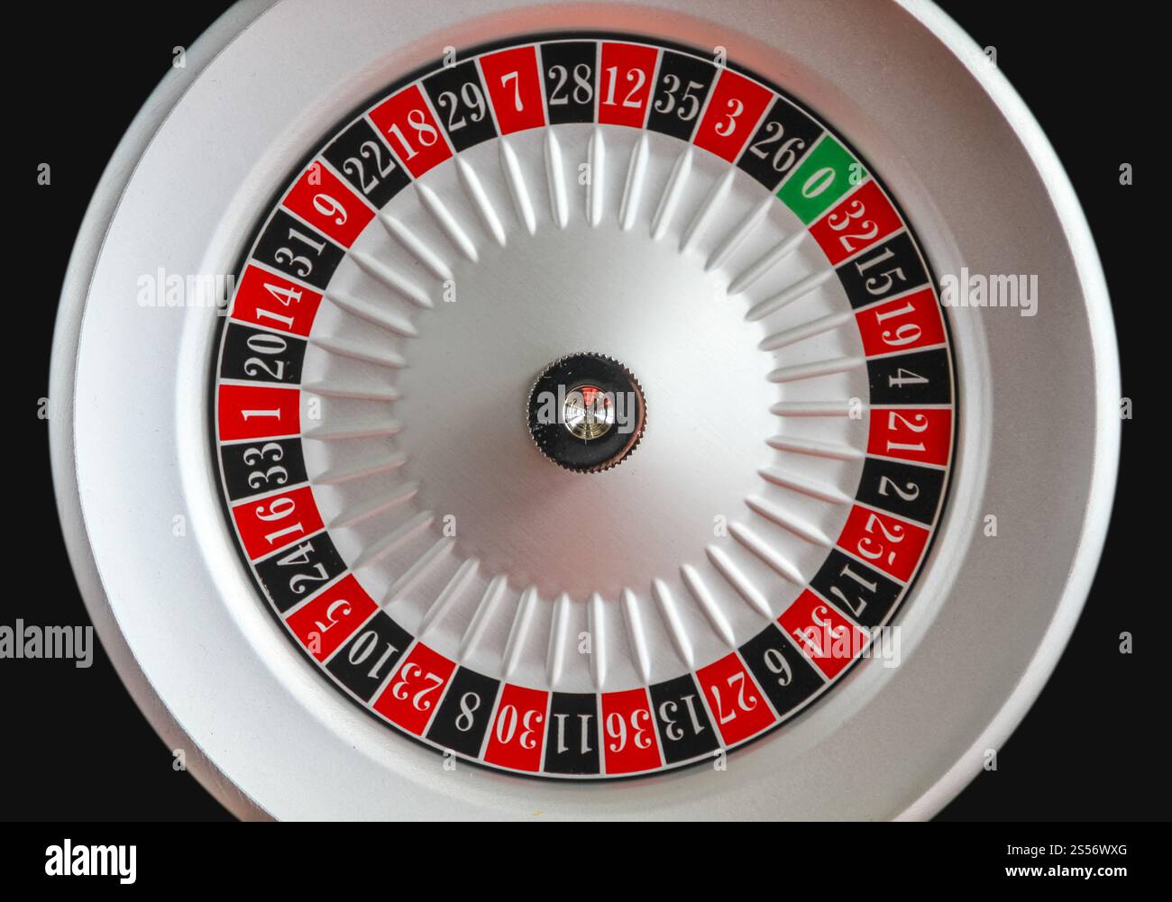 Casino roulette wheel isolated on Black background Stock Photo - Alamy