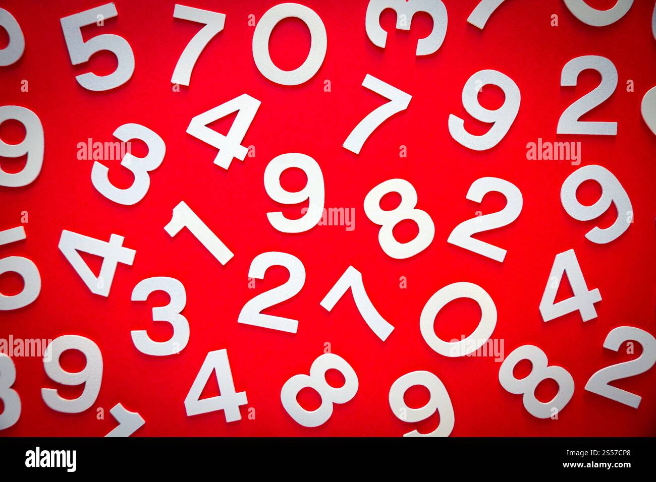 Mathematics background made with solid numbers on a board. Top view ...