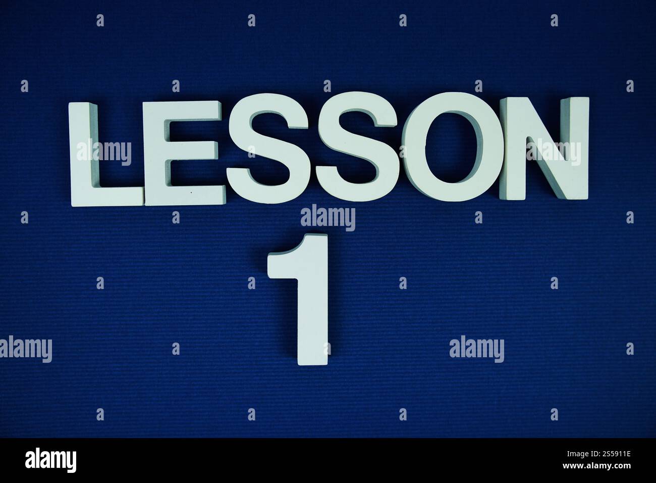Lesson 1 Lesson One alphabet letters on navy blue background Stock ...