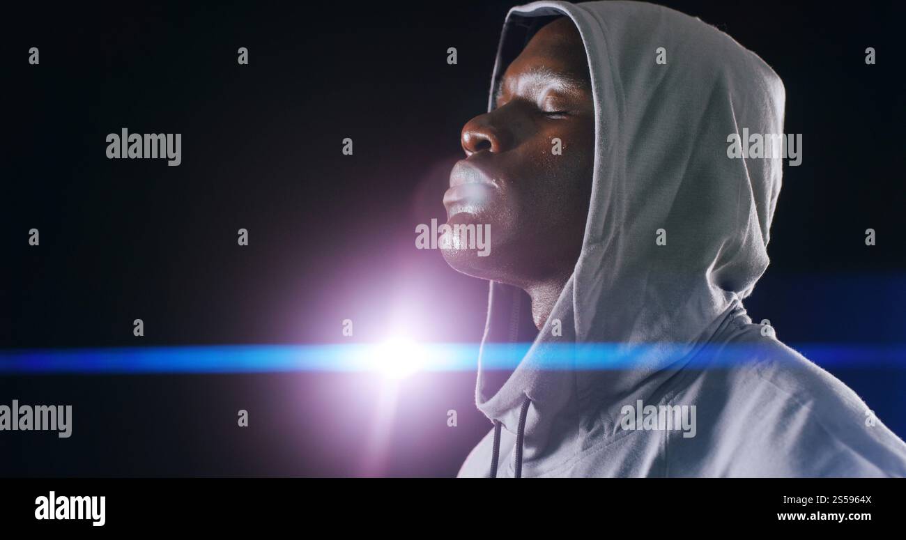 Thinking, black man and training with hoodie in studio for sports ...