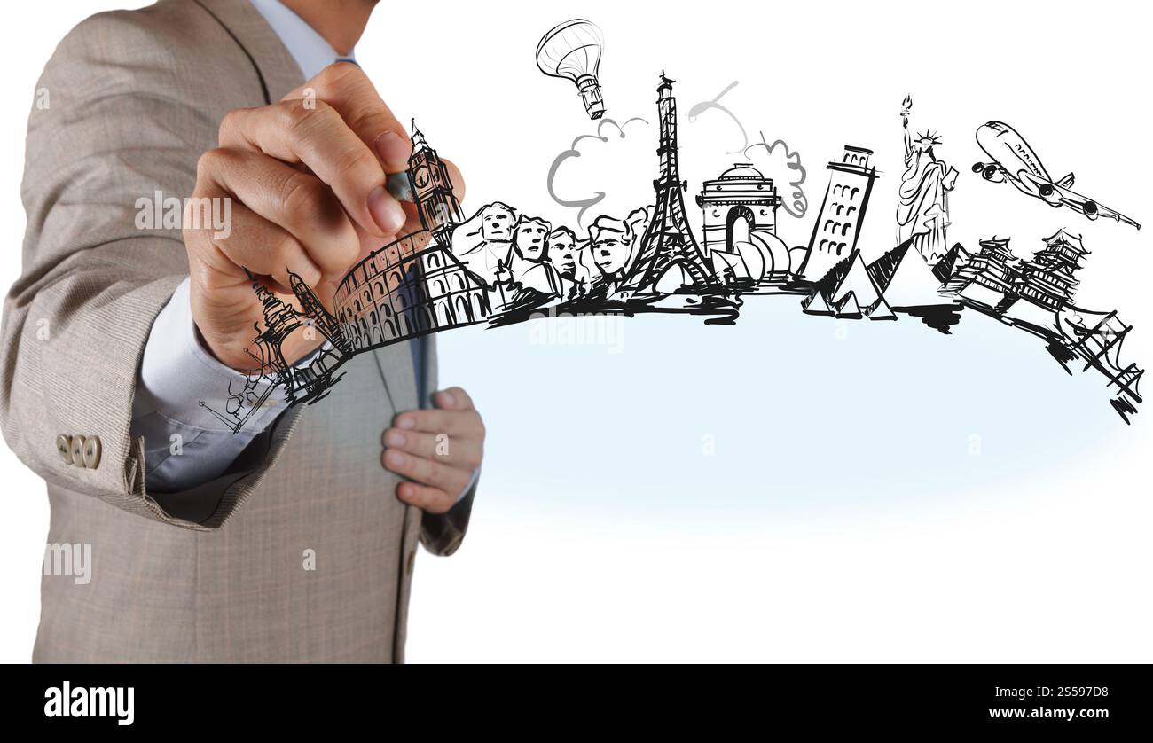 businessman hand draws dream travel around the world Stock Photo
