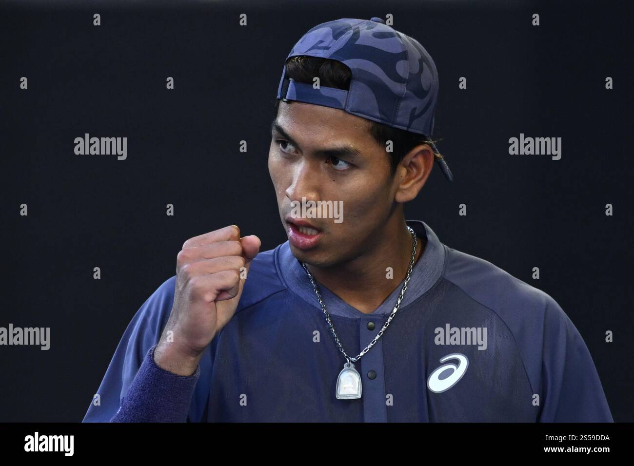 Kasidit Samrej of Thailand reacts during his round 1 match against