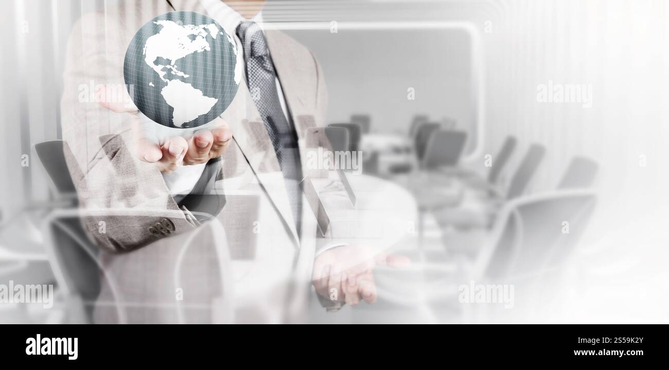 Double exposure of business  holding the earth and abstract board room as concept Stock Photo