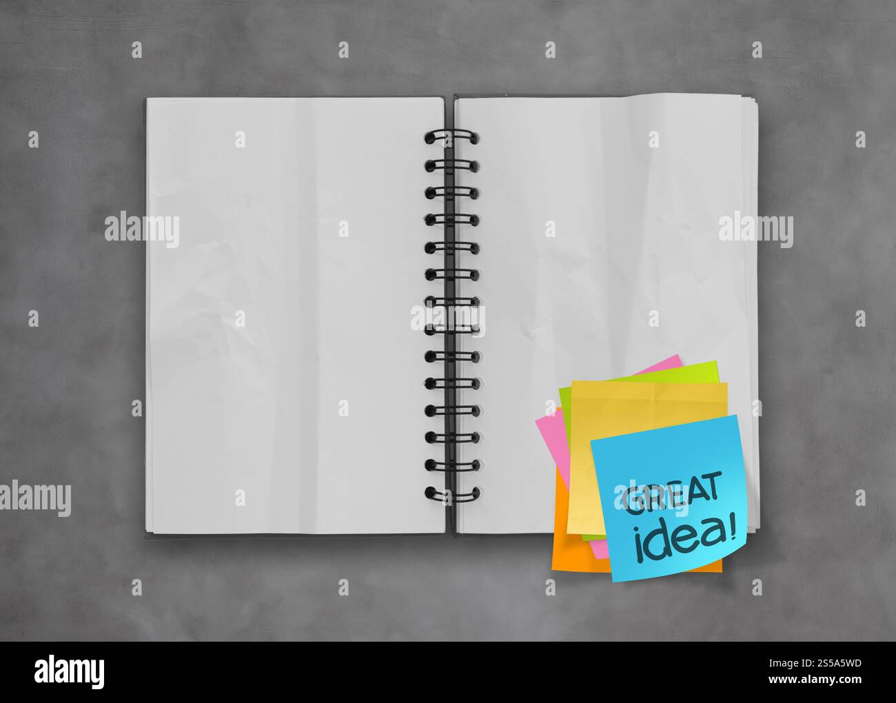 great idea word sticky notes with open blank note book on desk top ...
