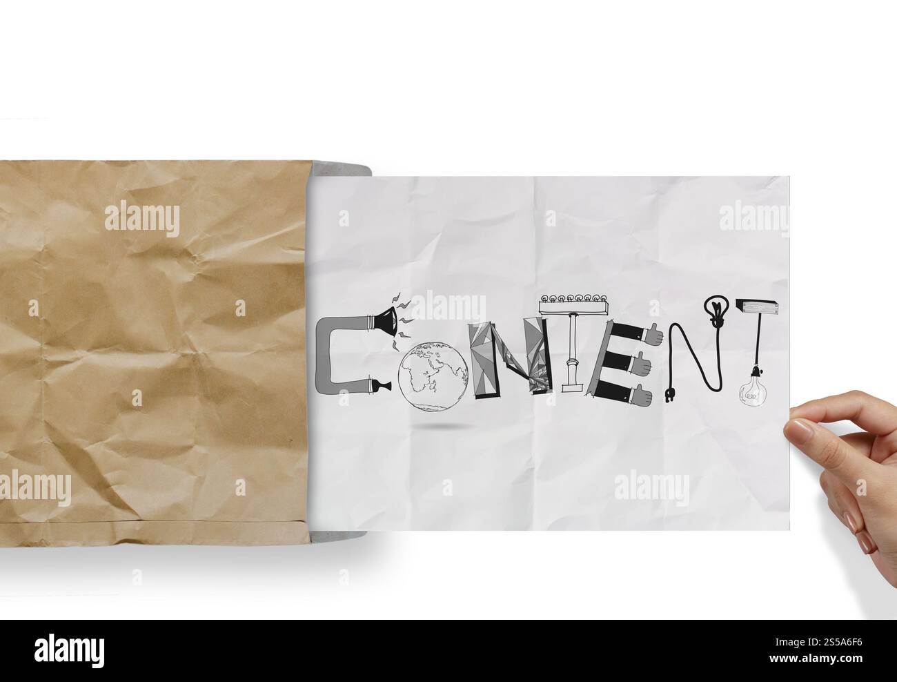 hand pulling crumpled paper from envelope with design word CONTENT as concept Stock Photo