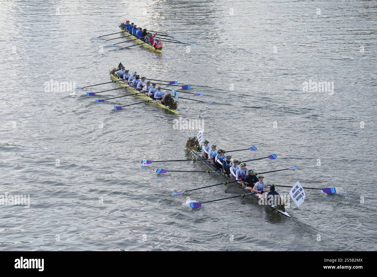 Roz Rows MPs and Olympians row past the Houses of Parliament in London as they ...