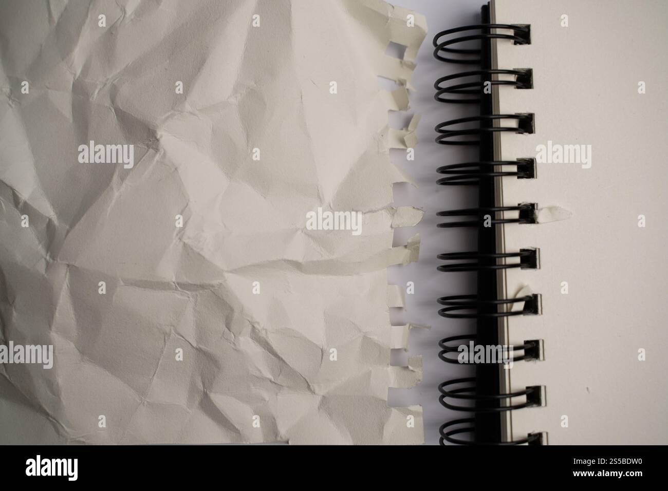 open spiral notebook And crumled page texture Stock Photo