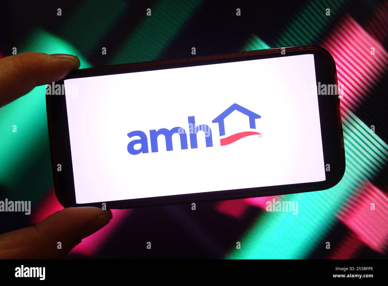 In this photo illustration, the American Homes 4 Rent company logo is ...