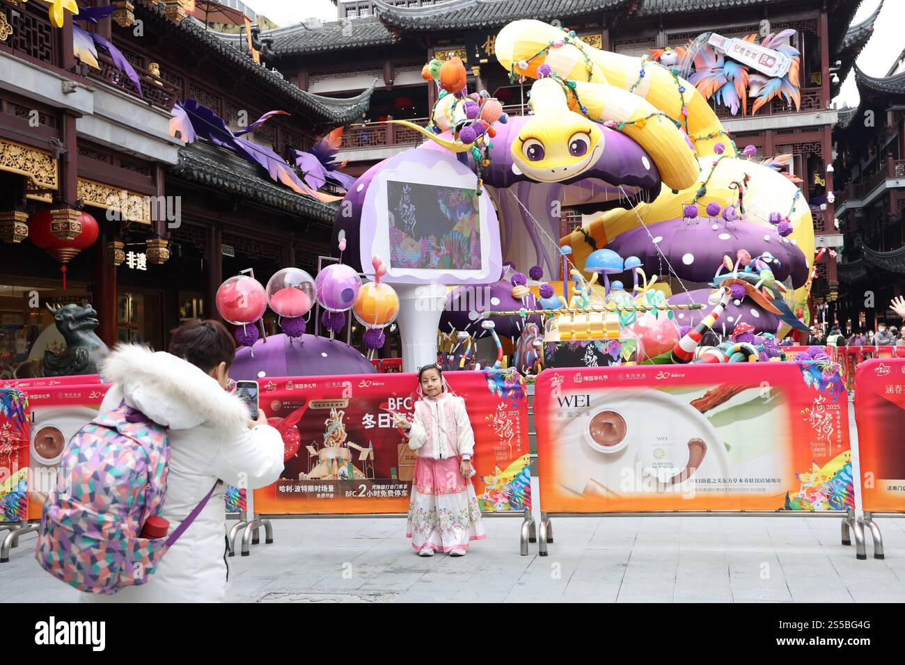 A lantern representing the snake attracts tourists at Yuyuan Garden in ...