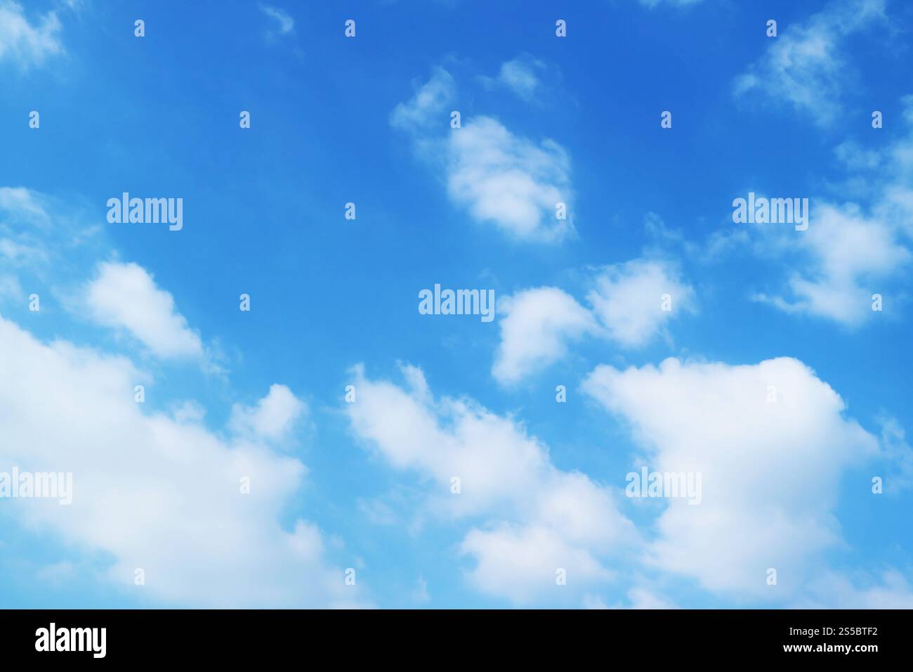 Fluffy Pure White Clouds Spreading across Vibrant Blue Sky Stock Photo ...