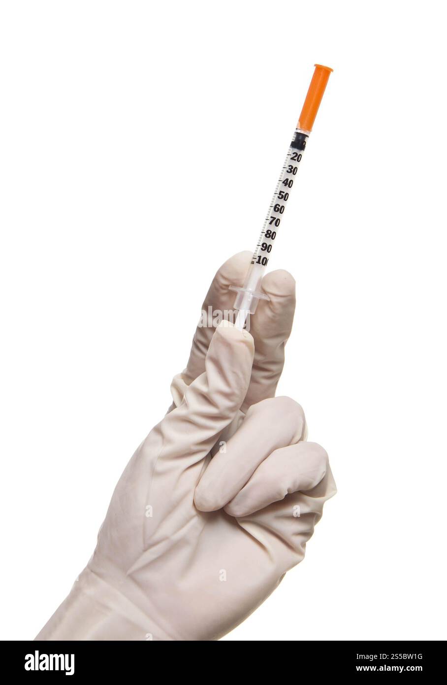 Hand holding syringe isolated on white background. Hand holding syringe ...