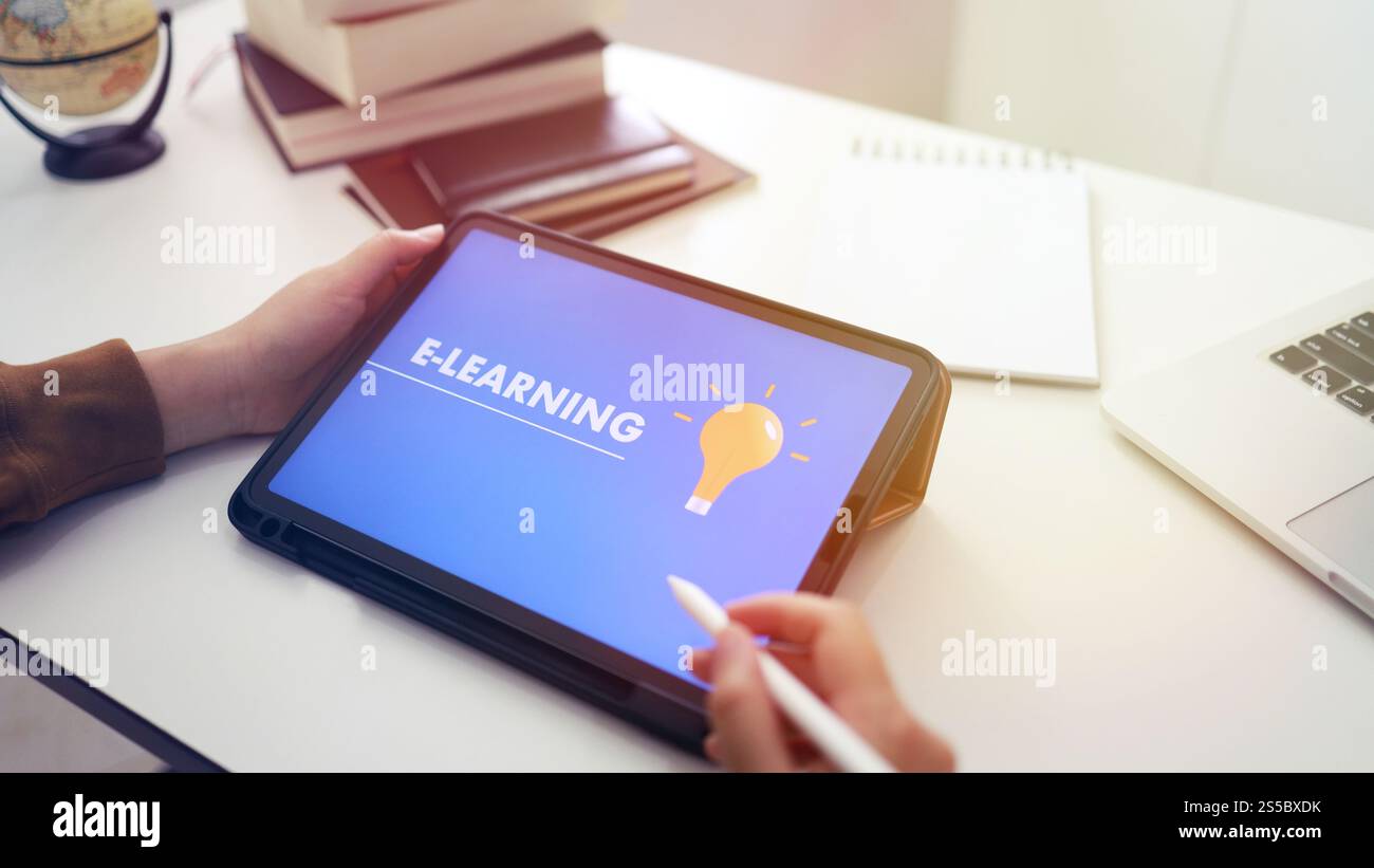 E-Learning concept with website on tablet. Education Internet Technology Web Online Stock Photo