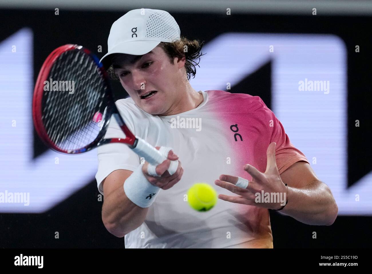 Joao Fonseca of Brazil plays a forehand return to Andrey Rublev of ...