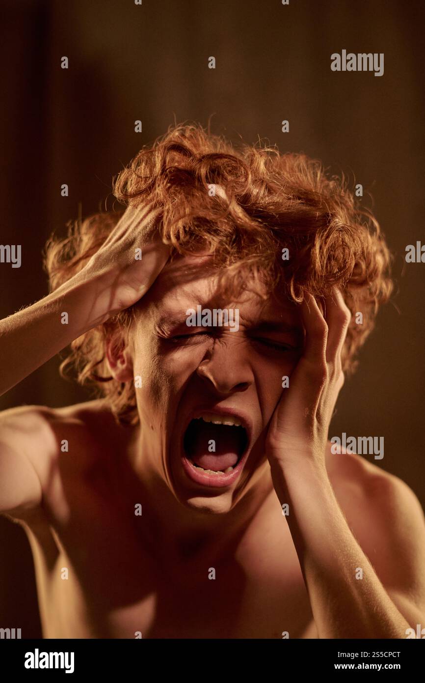 Vertical closeup crying young hi-res stock photography and images - Alamy