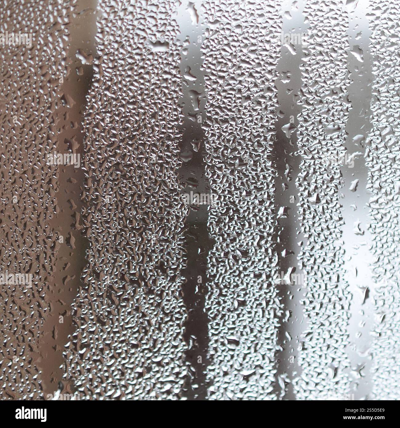 The texture of a misted glass with a lot of drops and condensation ...