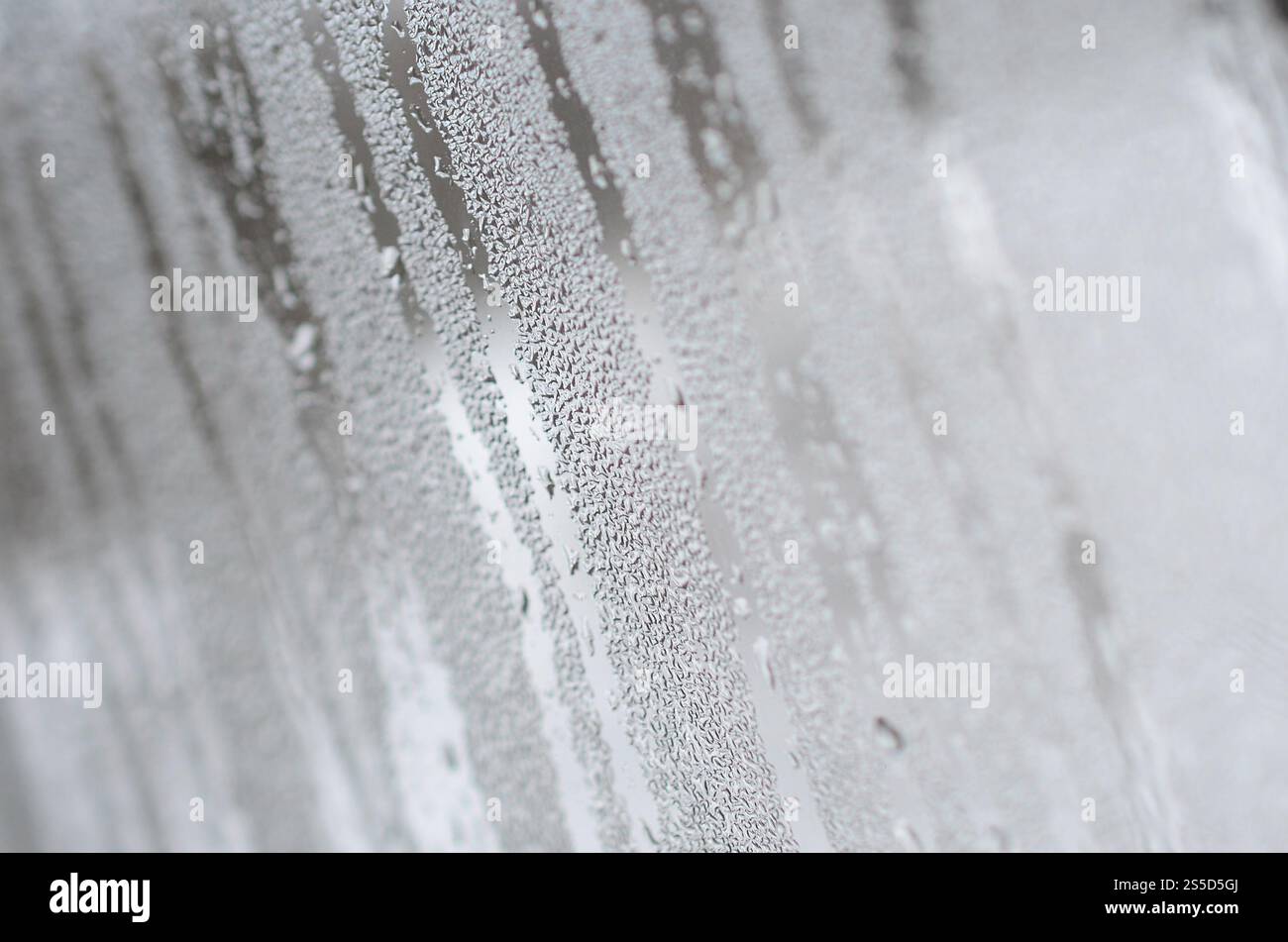 The texture of a misted glass with a lot of drops and condensation ...