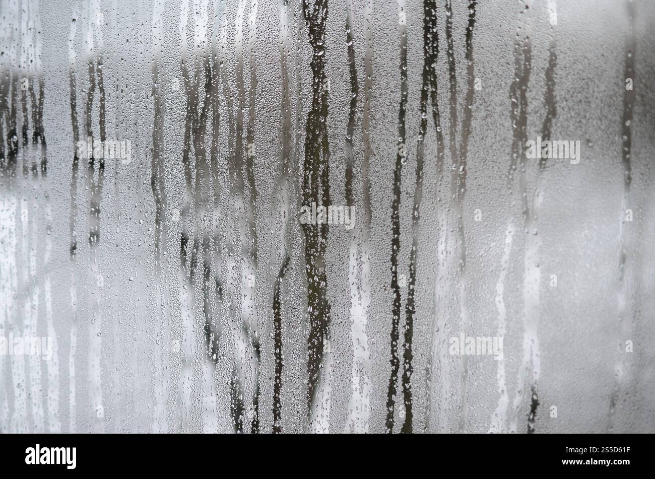The texture of a misted glass with a lot of drops and condensation ...