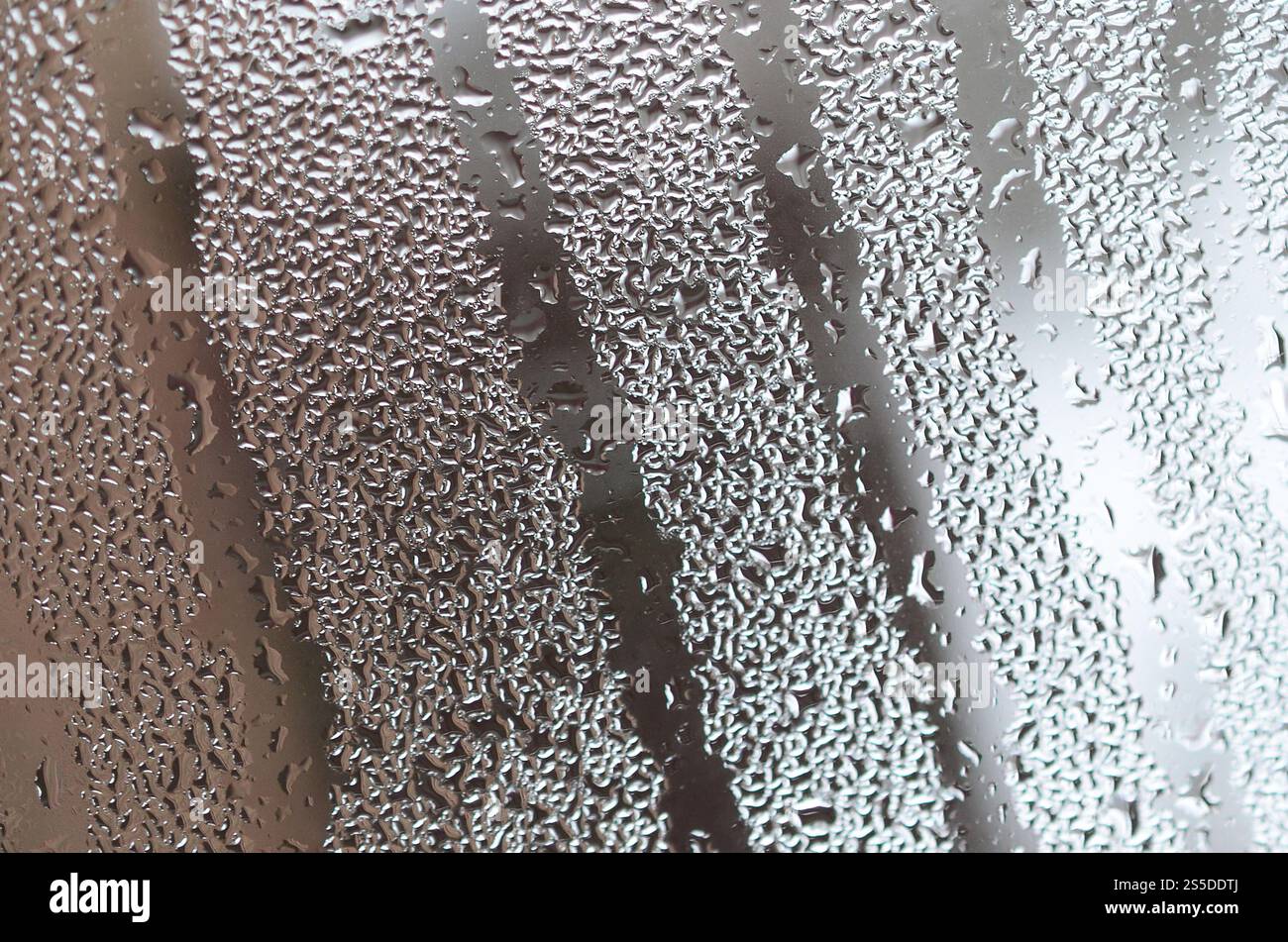 The texture of a misted glass with a lot of drops and condensation ...
