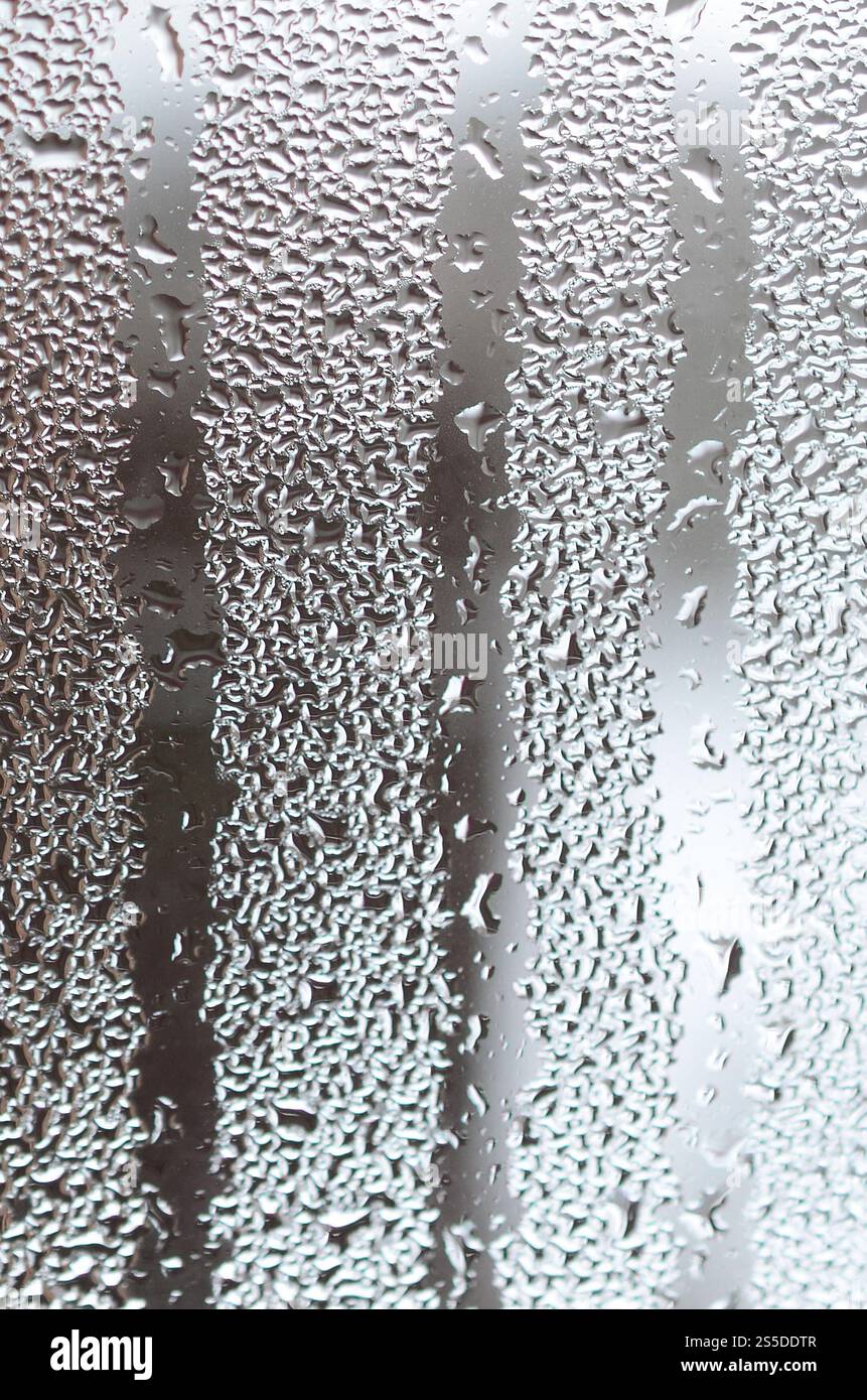 The texture of a misted glass with a lot of drops and condensation ...