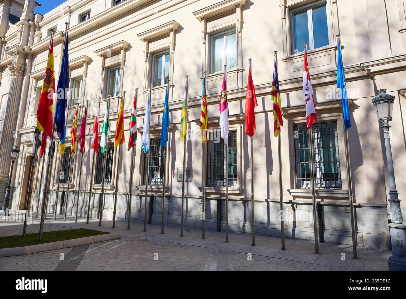 Flags of the Autonomous Communities in front of the façade of the ...