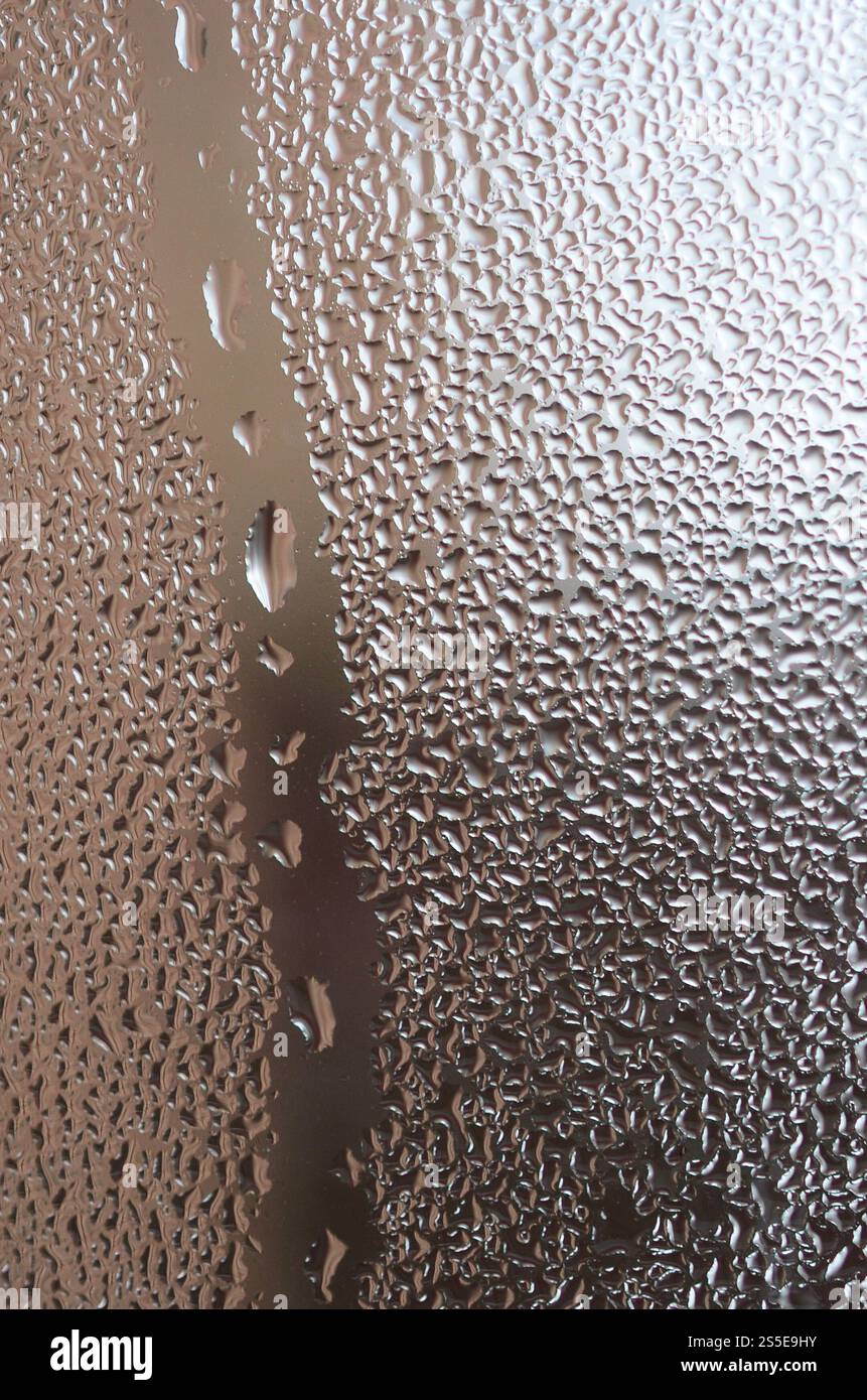 The texture of a misted glass with a lot of drops and condensation ...