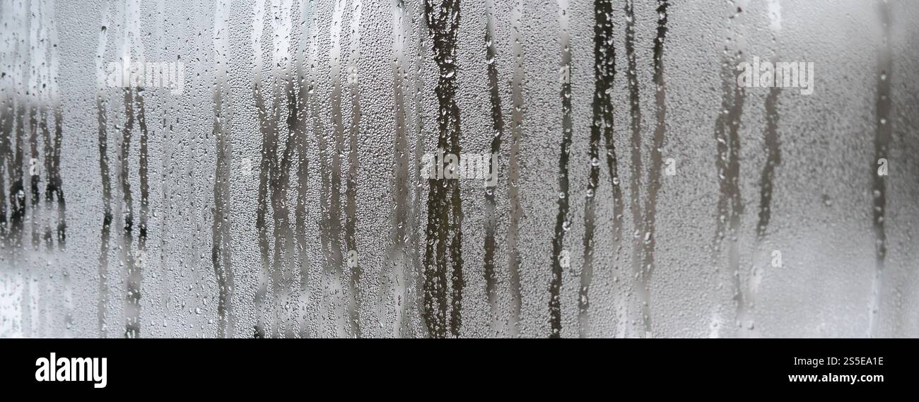 The texture of a misted glass with a lot of drops and condensation ...