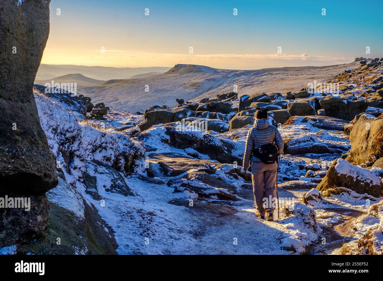 Female walker on The southern edge of Kinder Scout in the Peak District ...